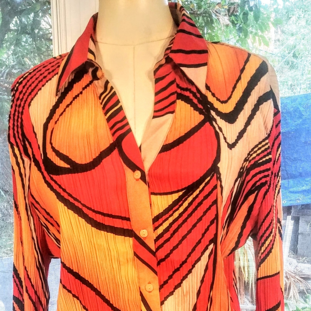 Psychedelic 70's looking orange and red blouse.